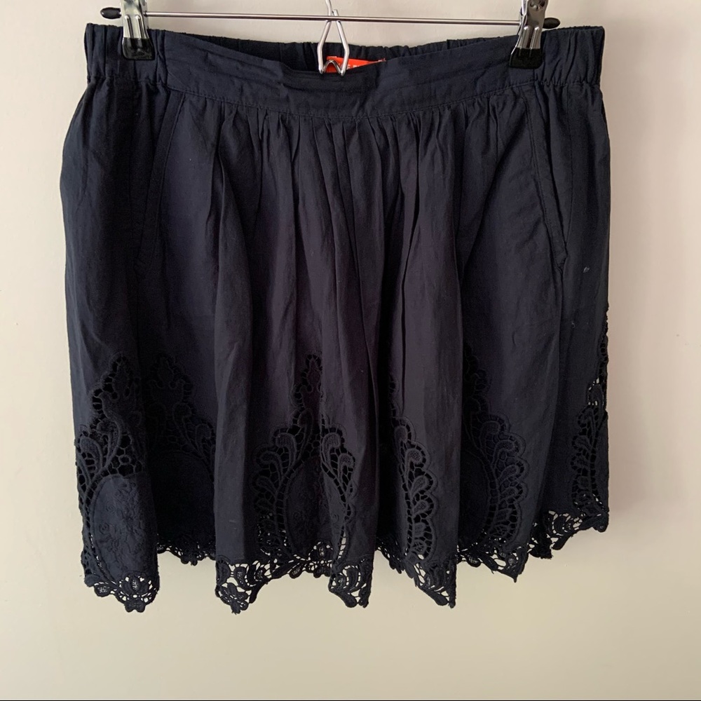 Navy eyelet tulip skirt